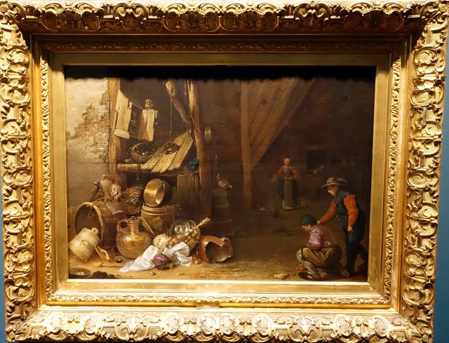 Farmhouse interior with boys playing marbles by Herman Saftleven