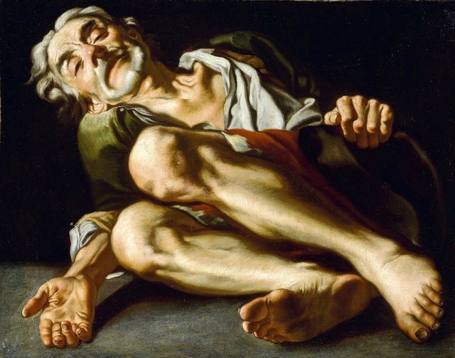 An old beggar, lying down, his hand reaching out by Gaspare Traversi