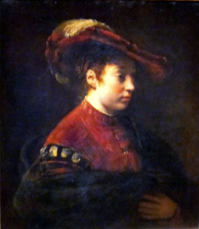 Young Woman in a Feathered Hat by Willem Drost
