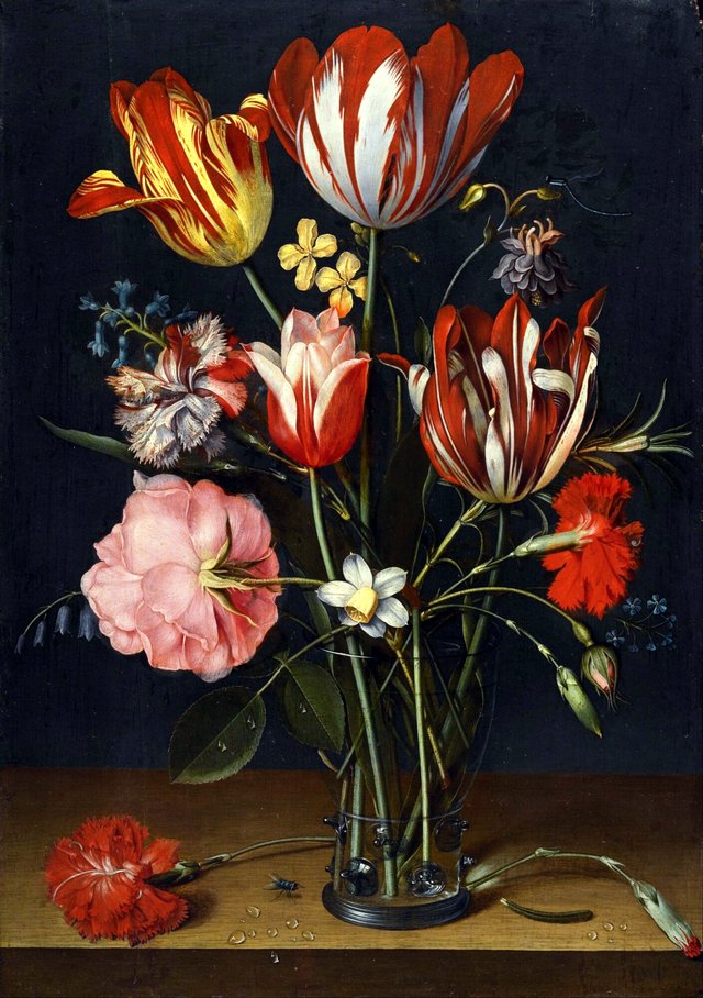 Still life of tulips, carnations, a rose and other flowers in a glass beaker resting on a wooded ledge by Jacob van Hulsdonck