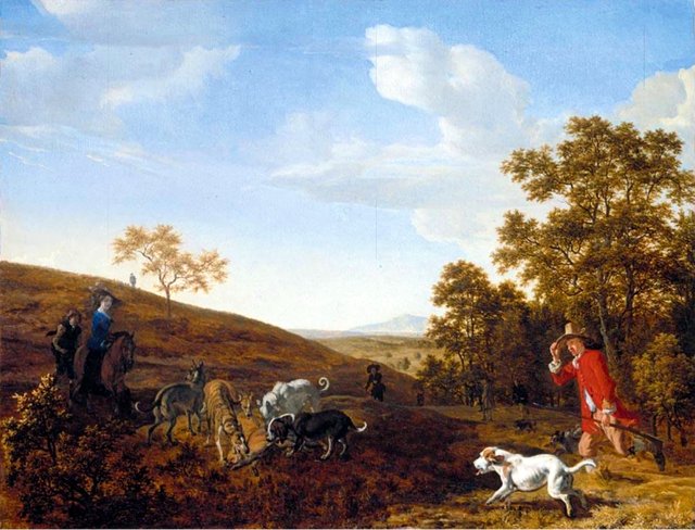 Landscape with a huntsman and his hounds attacking a fox by Ludolf de Jongh