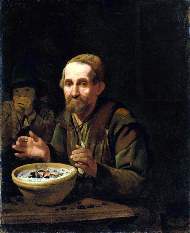 A beggar warming his hands on a pot of coal, with a boy in an interior by Michiel Sweerts