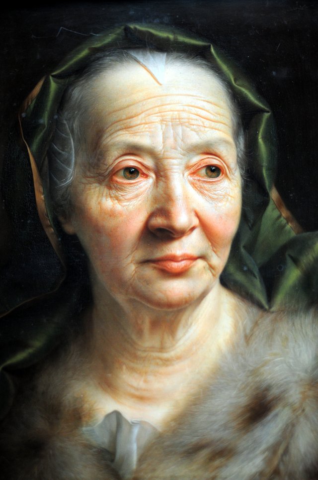 Portrait of an Old Woman with a green scarf by Christian Seybold