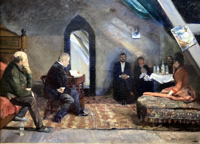 Reading aloud in the studio by Christian Krohg