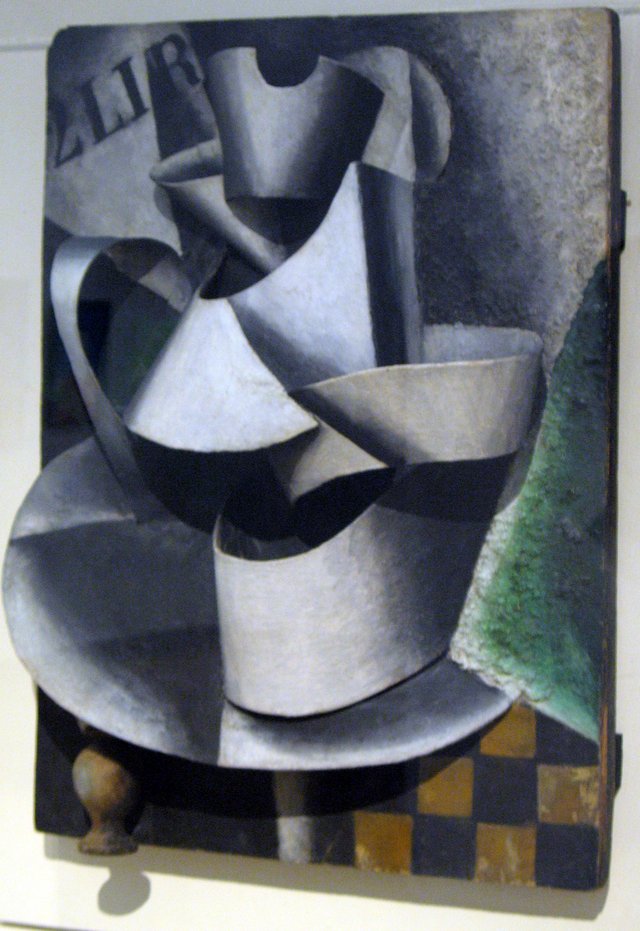 Jug on a table. Plastic painting by Lyubov Popova