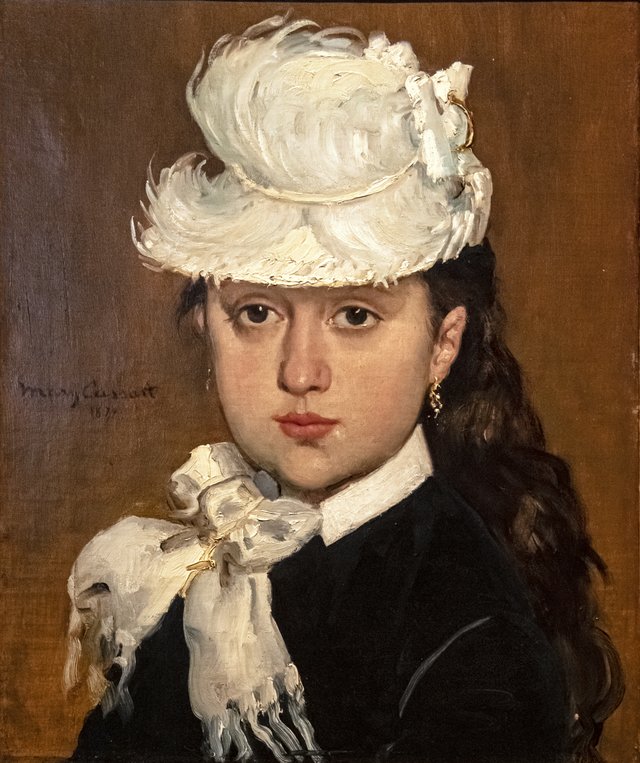 Portrait of a Young Woman in a White Hat by Mary Cassatt