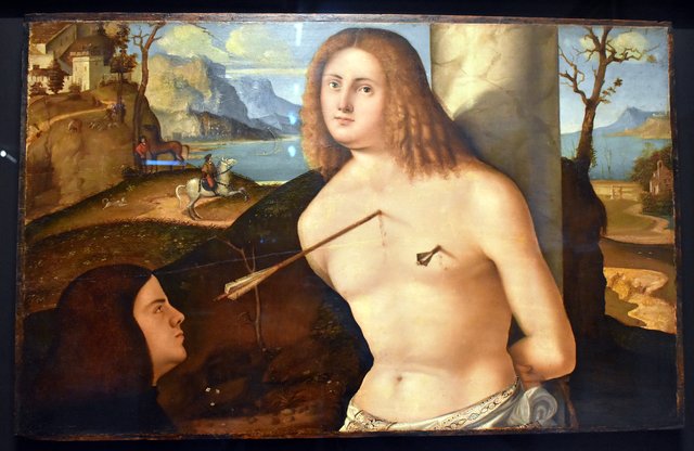 Saint Sébastien au donateur by Andrea Previtali