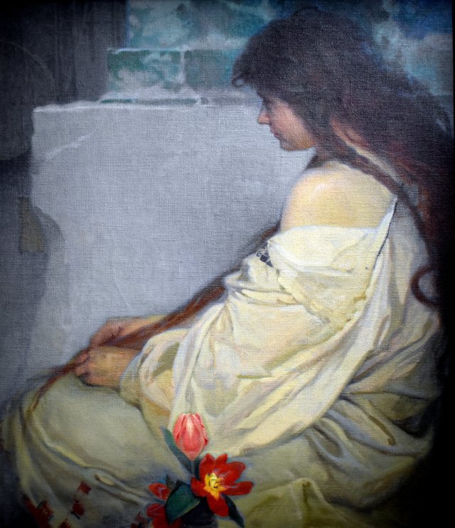 Girl with loose hair and tulips by Alphonse Mucha