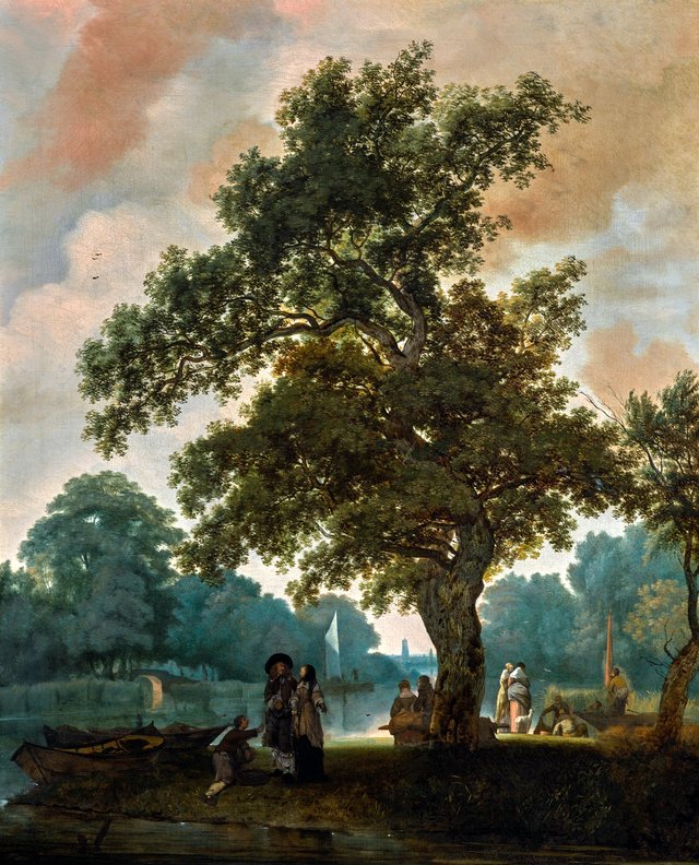 An elegant company by a lake, with Utrecht Cathedral in the distance by Jacob Esselens