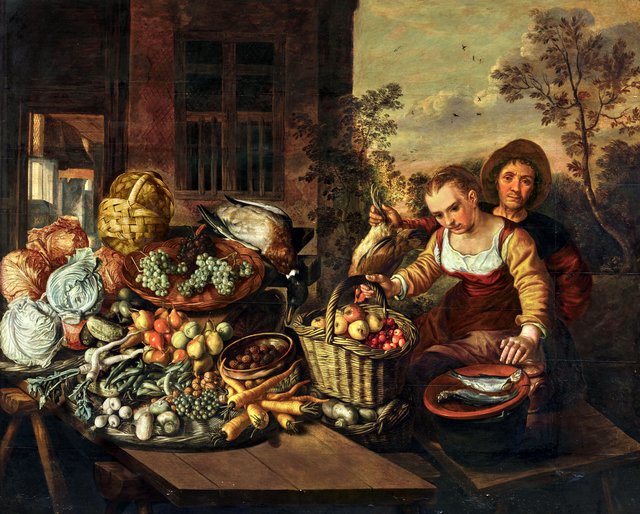 A poultry dealer and a young woman with an array of fruit, vegetables, fish and game on a table before a house by Joachim Beuckelaer