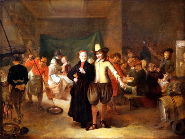An elegant couple amidst a festive company by Gerrit Lundens
