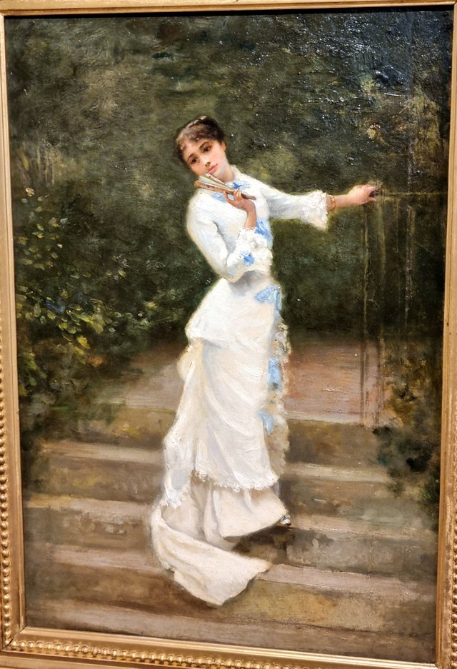 Jeune femme dans un jardin by Louise Abbéma