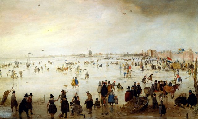 Skaters and golf players on frozen floodwaters by the Broederpoort at Kampen by Hendrick Avercamp