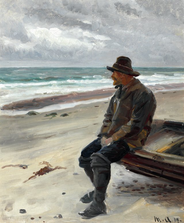 A fisherman by his boat on the beach. by Michael Ancher