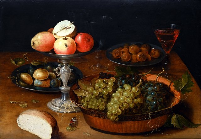 Still life with tazza, wine glasses and fruit on a table by Osias Beert