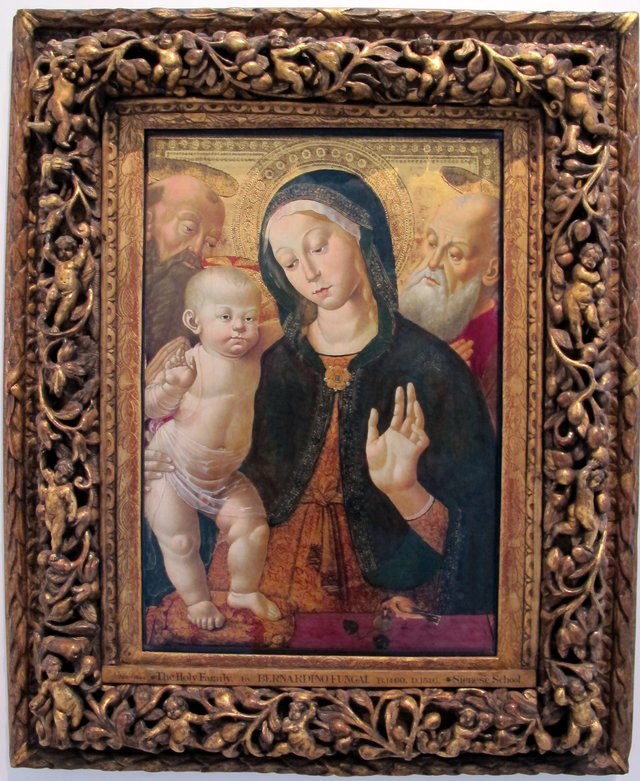 Vergine col bambino e due santi by Bernardino Fungai