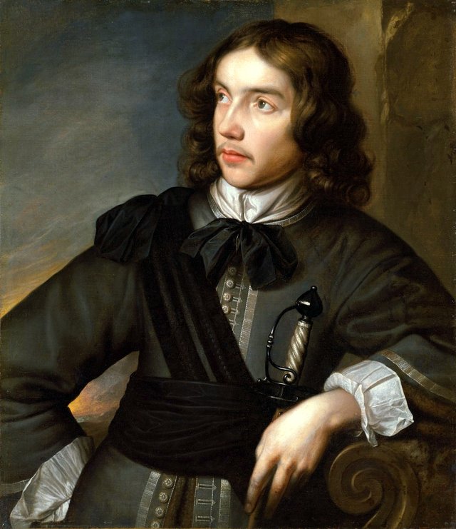 Portrait of a gentleman, half-length, in a grey goat and black sash, with a sword by Wallerant Vaillant