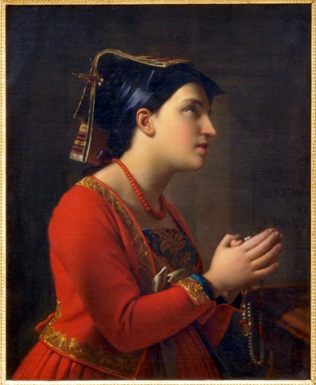 Young Italian woman praying. by Moritz Calisch