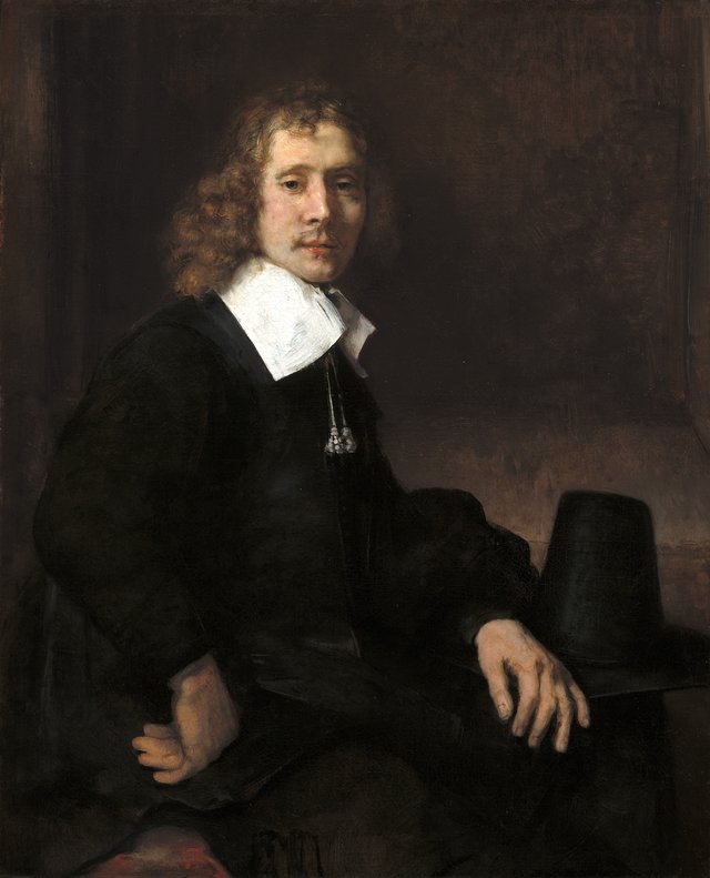 A Young Man Seated at a Table (possibly Govaert Flinck) by Govert Flinck