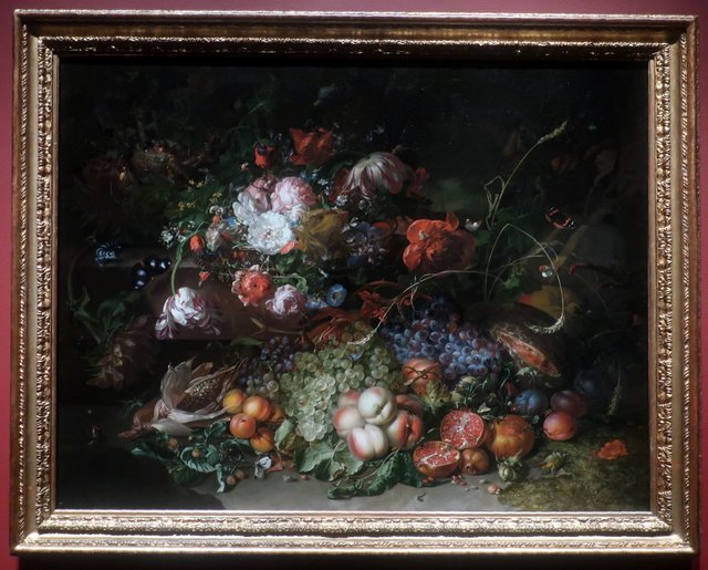 Flowers and fruit in a forest by Rachel Ruysch