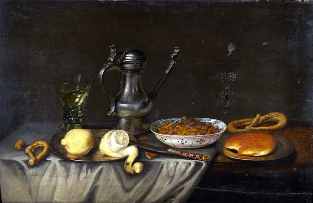 Still life with bread, nuts and lemons by Frans Ykens