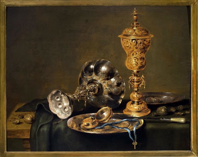 Still life with a watch. by Willem Claesz. Heda