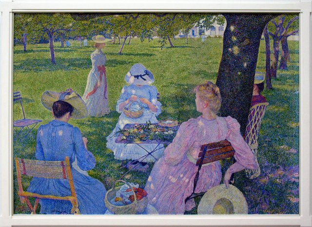 A family gathering in an orchard by Théo van Rysselberghe