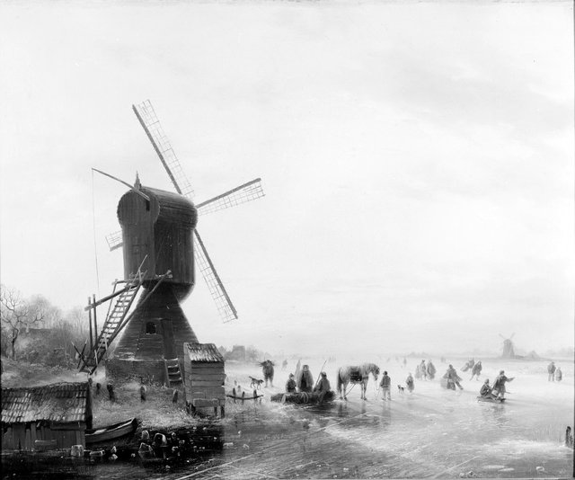 Windmolen aan een bevroren waterweg met schaatsers by Charles Leickert