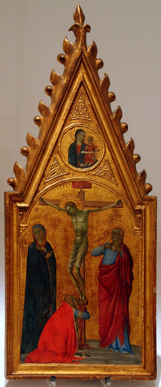 The crucifixion under a Madonna in a medallion by Andrea Vanni