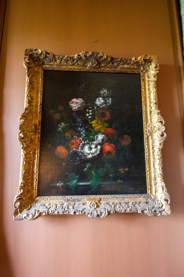 A Vase with Flowers on a Ledge by Maria van Oosterwijck