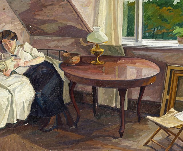 Interior with a woman reading. by Edvard Weie