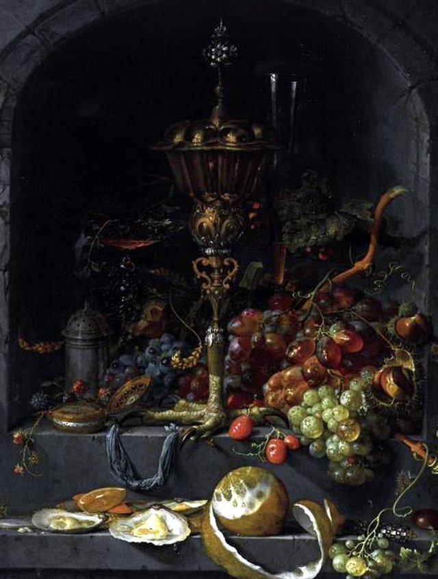 Still life of fruit and a chalice in a niche by Abraham Mignon