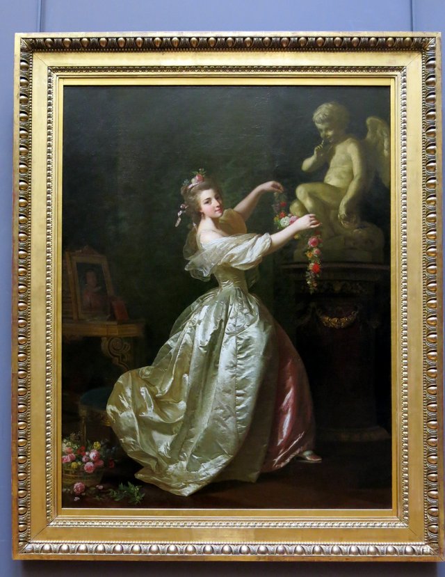 Jeune Fille s'apprêtant à orner la statue de l'amour d'une guirlande de fleurs by Alexander Roslin