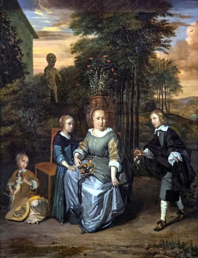 woman with children in the garden by Barend Graat
