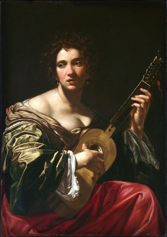 Woman Playing a Guitar by Simon Vouet