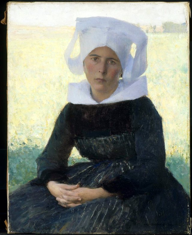 Woman in Breton Costume Seated in a Meadow by Pascal Dagnan-Bouveret