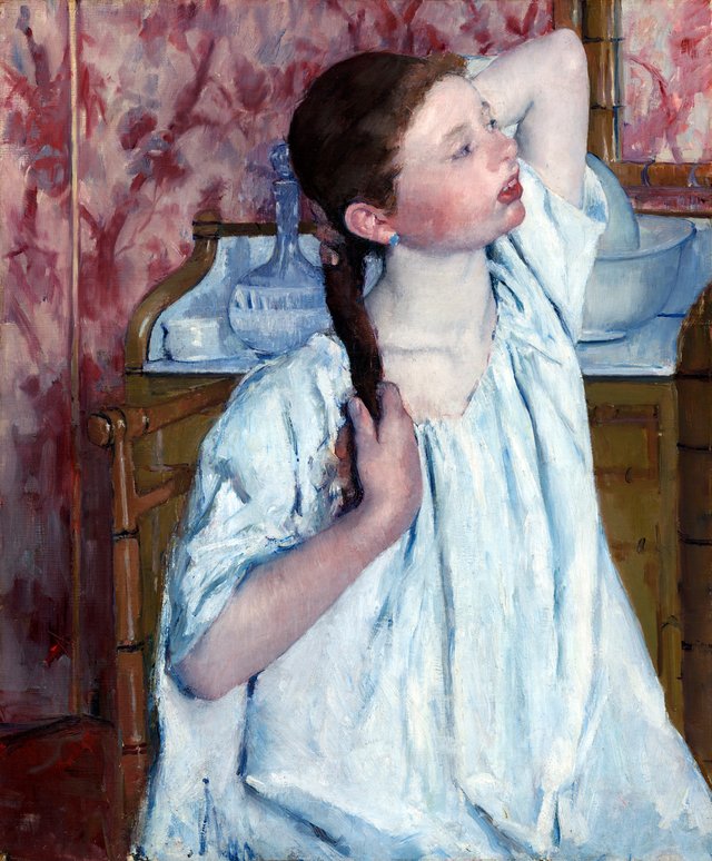Girl Arranging Her Hair by Mary Cassatt