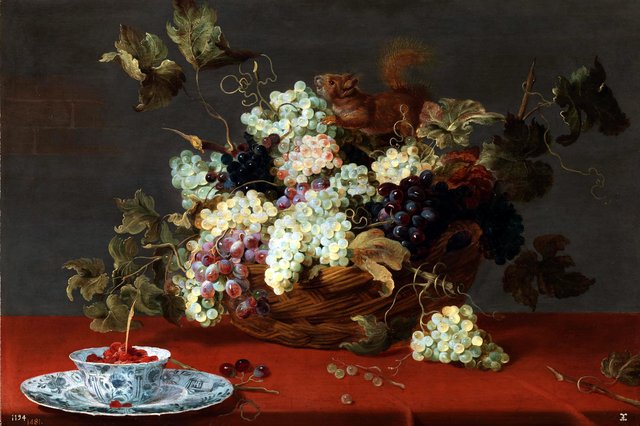 A fruit still life with a basket of grapes and a squirrel on a table by Frans Snyders