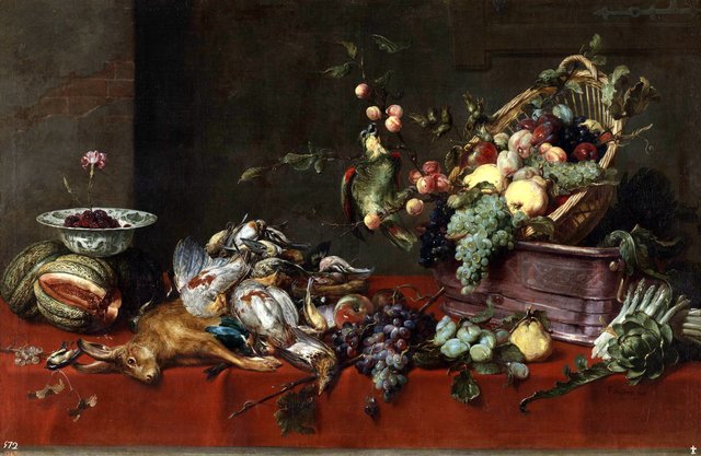 A still life with game, vegetables and fruit on a table, with a parrot on a branch by Frans Snyders