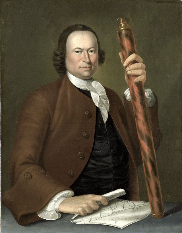 Portrait of an officer at sea with a map and binoculars in hand by John Greenwood
