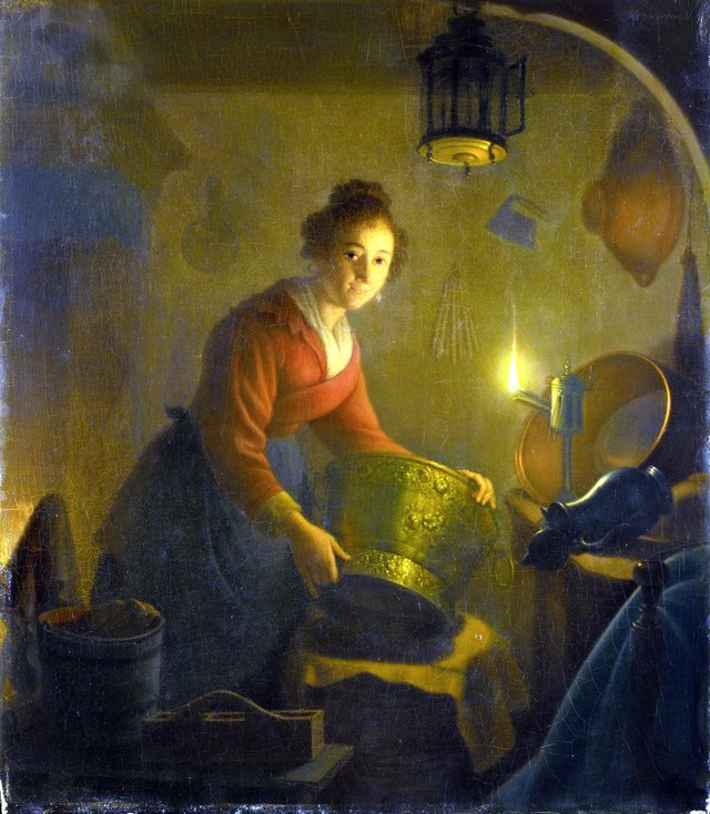 A Woman in a Kitchen by Candlelight by Michiel Versteegh