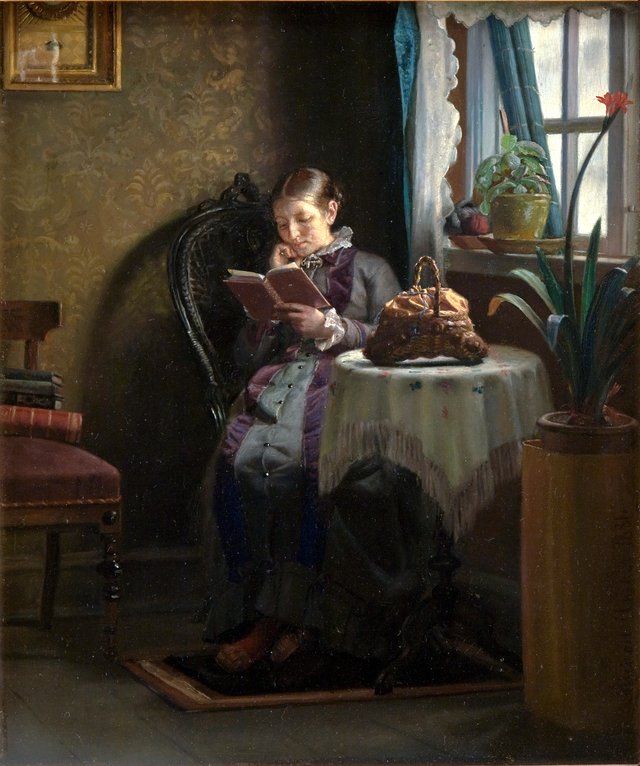 Anna Ancher læsende by Michael Ancher