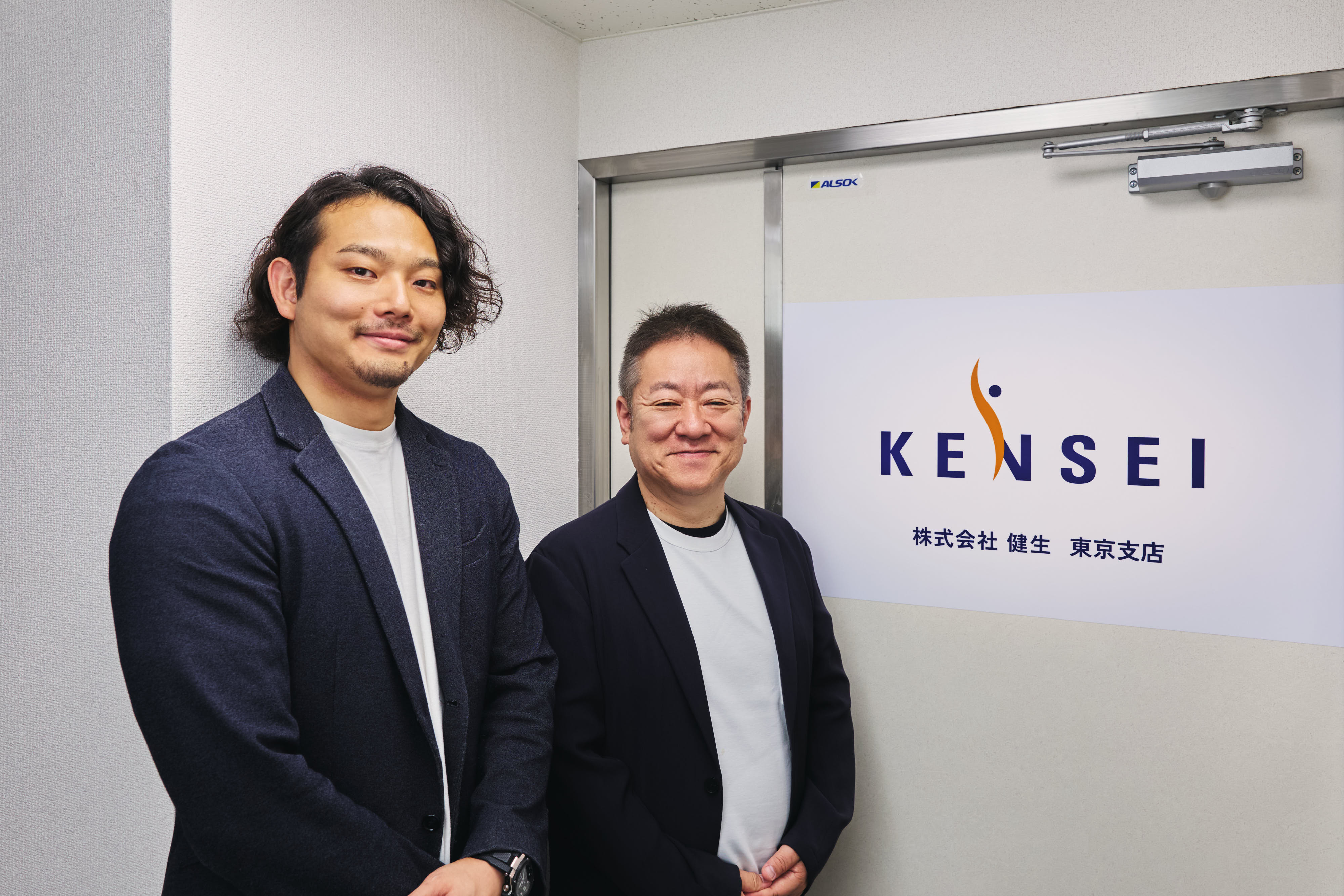 ワンネゴの導入企業である株式会社健生の佐藤部長と佐藤常務