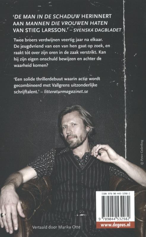 Achterkant van De man in de schaduw