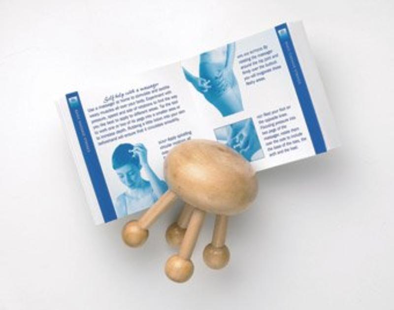 Achterkant van De Massage boek-box