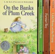 Omslag van Little House 4-Book Box Set Little House in the Big Woods, Farmer Boy, Little House on the Prairie, On the Banks of Plum Creek