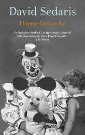 Omslag van Happy-Go-Lucky 'Unquestionably the King of Comic Writing' Guardian
