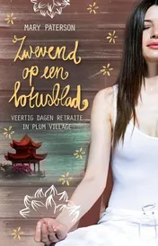 Omslag van Zwevend op een lotusblad
