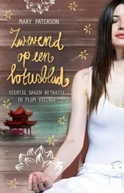 Omslag van Zwevend op een lotusblad