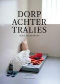Omslag van Dorp achter tralies